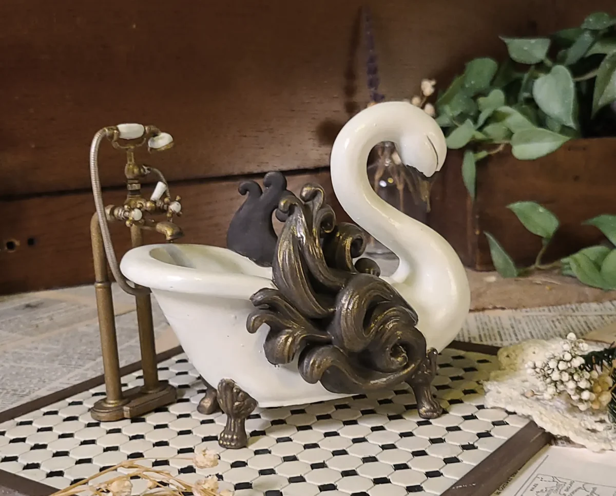 Hand-painted swan bathtub & faucet for 1:12 scale dollhouses by Dove & Pear. Storybook-inspired miniature appliances, fixtures, furniture and décor from Chuckleberry Town. Original Dove & Pear design.